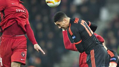 Chris Smalling of Manchester United heads the ball against Midtyjlland on Thursday night during their Europa League contest. Henning Bagger / Scanpix Denmark / Reuters / February 16, 2016