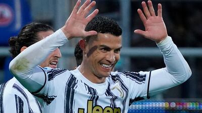 Ronaldo celebrates his hat-trick. AP