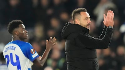Brighton manager Roberto de Zerbi celebrates his team's Europa League win over Ajax at the Amex stadium. AP