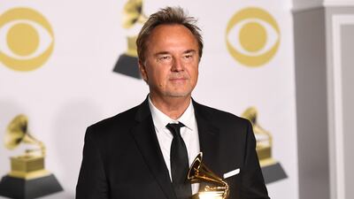 Pianist Peter Kater holds the trophy for Best New Age Album in the press room. AFP