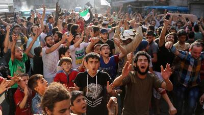 Syrians gather on an Aleppo street for celebrations on August 6, 2016, after rebels said they have broken a three-week government siege. Thaer Mohammed/AFP