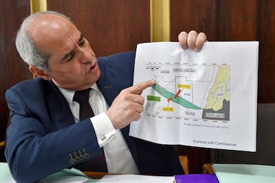 Lebanese MP Melhem Khalaf holds up a map of the Line 29 maritime demarcation zone in Beirut. Mr Khalaf claimed Israel was drilling for oil in some fields, including those adjacent to the Lebanese border. EPA