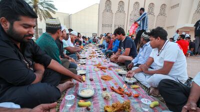 Abu Dhabi residents gather at Mary Mother of Jesus Mosque to break fast on the second day of Ramadan. Victor Besa / The National