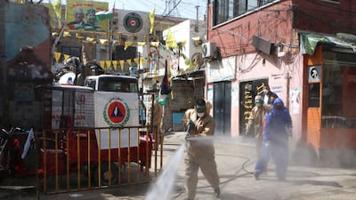 Workers disinfect the Wavel camp on Wedneday. AFP