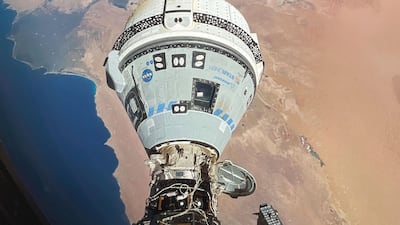 The Starliner spacecraft docked to the Harmony module of the International Space Station, orbiting 421km above Egypt's Mediterranean coast, on June 13, 2024. Nasa via AP