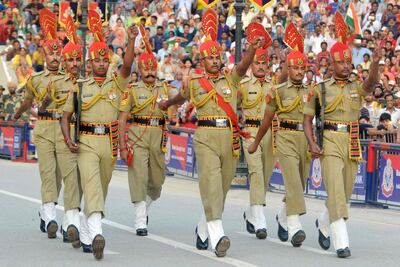 Indian Border Security Force personnel march during the daily beating of the retreat ceremony at the India-Pakistan Wagah Border Post. Narinder Nanu / AFP