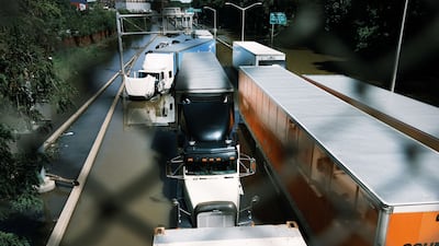 Cars sit abandoned on the flooded Major Deegan Expressway in the Bronx following a night of heavy wind and rain from the remnants of Hurricane Ida on September 2, 2021 in New York City. AFP