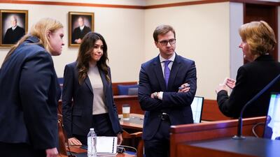 Depp's lawyer Ms Vasquez and Heard's lawyer Ms Bredehoft speak in the courtroom before testimony. AP