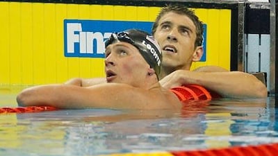 Michael Phelps, right, was ahead of Ryan Lochte at the halfway mark, but Lochte was able to get past the 14-time Olympic champion to take gold in Shanghai.
