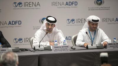 Thani Al Zeyoudi, left, a UAE delegation member, Adel Al Hosani, the Abu Dhabi Fund for Development director of operations, at the press conference announcing $57 million loans for five renewable energy projects in developing countries. Silvia Razgova / The National