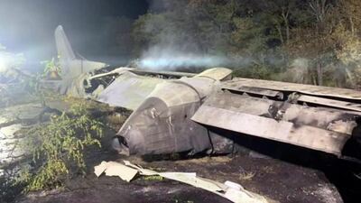 Wreckage of an AN-26 military plane seen after it crashed in the town of Chuguyiv close to Kharkiv. Kharkiv Regional State Administration via AP