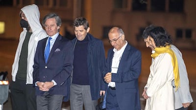 From left, a Danish citizen who was also released, Mr Ghaderi, Mr Mossaheb and Ms Lahbib. AFP