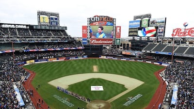 Sachin’s Blaster and Warne’s Warriors players line up during the US national anthem before the start of the first in a three-match, all-star T20 series. Jewel Samad / AFP