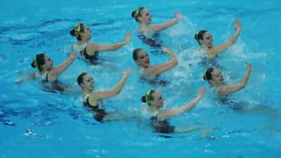 Molecules in liquid water make and break links with each other but retain basic patterns like the synchronised swimmers above.