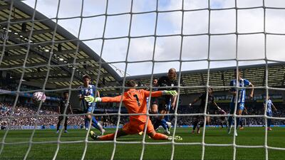 Erling Haaland scores for Manchester City at the Amex Stadium. Getty Images