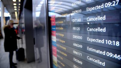 An arrivals board in the South Terminal building. Reuters