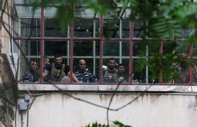 Lebanese police at the Justice Palace in Beirut, where former central bank governor Riad Salameh was questioned by a judge. Reuters