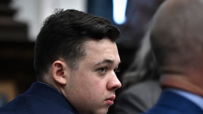 Kyle Rittenhouse listens as lawyers and the judge talk about jury instructions at the Kenosha County Courthouse in Kenosha, Wisconsin. AP