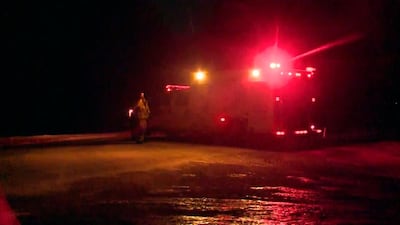 In this image taken from video, emergency services near the scene of a bus crash carrying the Humboldt Broncos of the Saskatchewan Junior Hockey League, near Nipawin, Canada, Friday April 6, 2018. CTV via AP