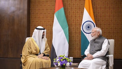 Sheikh Theyab bin Mohamed with Narendra Modi on the sidelines of the NDTV World Summit in New Delhi. Photo: Abu Dhabi Media Office