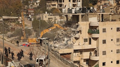 Israeli security forces gathered at the site of the demolition. AFP