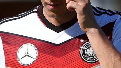 Mesut Ozil's national team form has been criticised ahead of Germany's World Cup 2014 Group G opener against Portugal on Monday. Patrik Stollarz / AFP / June 11, 2014