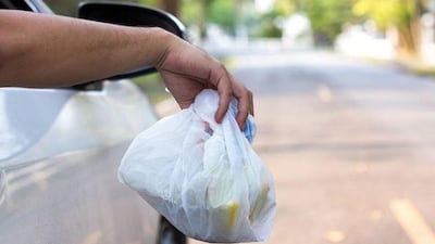 Drivers face Dh1,000 fine and six points on their licence if caught throwing rubbish from a vehicle. Courtesy: Abu Dhabi Police