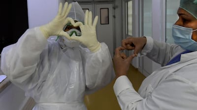 Discovering vaccines only marked the end of the beginning in the fight against Covid-19. AFP