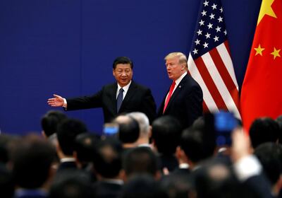 U.S. President Donald Trump and China's President Xi Jinping meet business leaders at the Great Hall of the People in Beijing, China, November 9, 2017. Photo: Reuters