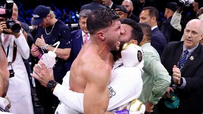 Tommy Fury celebrates with his coaching team after defeating Jake Pau. Getty Images