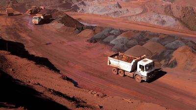 Trucks transport material at the Serra Azul iron ore mine in Minas Gerais, Brazil. The Serra Azul mine is operated by MMX Mineracao & Metalicos SA, the iron-ore producer controlled by Brazilian billionaire Eike Batista. Rich Press / Bloomberg