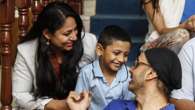 Sukhbir Singh makes friends of fans during his visit to the Dubai Autism Centre. The star says he jumped at the chance to meet staff and children. Antonie Robertson / The National