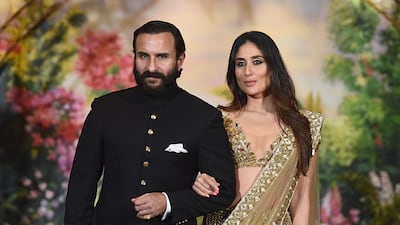 Indian Bollywood actors Saif Ali Khan and wife Kareena Kapoor Khan pose for a picture during the wedding reception of actress Sonam Kapoor and businessman Anand Ahuja in Mumbai in 2018. AFP