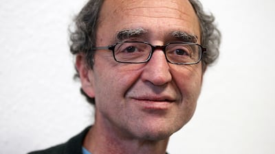 In this January 7, 2011 photo, Turkish-German writer Dogan Akhanli is photographed in Cologne, Germany. AP