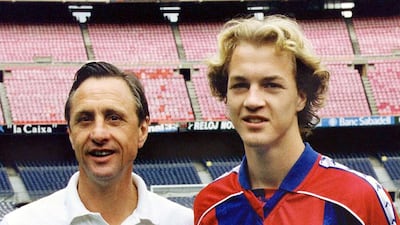 Johan Cruyff, left, stands with his son Jordi at Barcelona in 1995. Jordi was a promising player at Barca and started well under the management of his father. However, Johan was dismissed, and Jordi was soon on his way to Manchester United. AFP