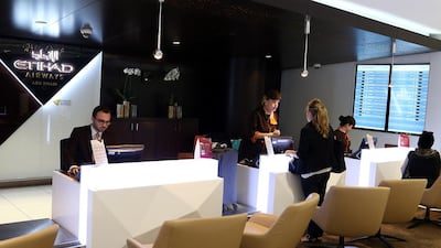 The concierge desk for the Etihad Airways First Class check-in at Abu Dhabi International Airport. Delores Johnson / The National