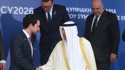 Jordan's Crown Prince Hussein bin Abdullah, left, with Gulf Co-operation Council Secretary General Jasem Al Budaiwi. EPA