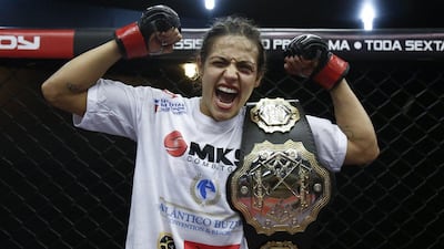 Brazilian MMA fighter Poliana Botelho, after her XFC flyweight title win last month. Miguel Schincariol / AFP