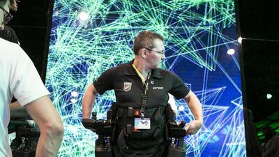 Lee Warn, from New Zealand, demonstrates the REX Bionics at GITEX Technology Week. REX Bionics is a robotic mobility device that is designed for people with mobility impairments. Reem Mohammed / The National