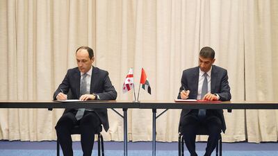 Dr Thani Al Zeyoudi, UAE Minister of State for Foreign Trade, right, and Levan Davitashvili, Georgia’s Vice Prime Minister and Minister of Economy and Sustainable Development, sign the agreement. Photo: UAE Government