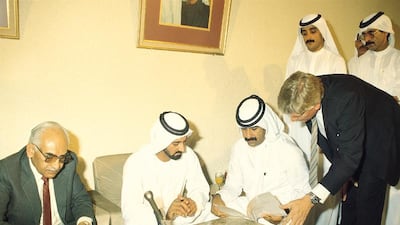 Sheikh Ahmed Al Maktoum, second from the left, became chairman of Emirates when the airline was launched. He was also appointed President of the Dubai Department of Civil Aviation in the same year. He is currently chairman and chief executive of Emirates Airline and Group. To the right is Maurice Flanagan. He moved to Dubai in 1978 to run dnata and later became managing director of Emirates airline and then of the Emirates Group. he stepped down as executive vice-chairman in 2013 and passed away earlier this year. Courtesy Emirates