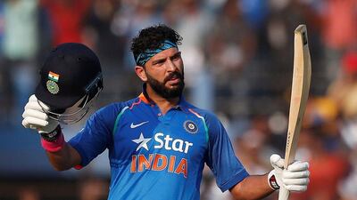 Yuvraj Singh celebrates his century for India against England on Thursday. Adnan Abidi / Reuters