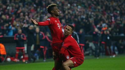 Kingsley Coman (L) of Bayern Munich celebrates scoring his team’s fourth goal with his teammate Thiago Alcantara (R) during the Uefa Champions League round of 16, second Leg match between FC Bayern Munich and Juventus at the Allianz Arena on March 16, 2016 in Munich, Germany. (Photo by Alexander Hassenstein/Bongarts/Getty Images)