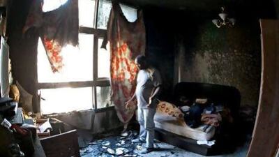 Standing in what was his bedroom Dove Ifeanyi estimates he lost Dh200,000 in cash and belongings.