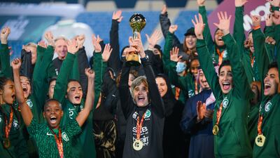Monika Staab, the Saudi Arabia women's head coach, celebrates with her team. Photo: Saudi Arabian Football Federation