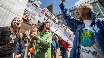 Environmental protesters in the Netherlands. The views of climate campaigners are becoming popular among oil investors Bloomberg
