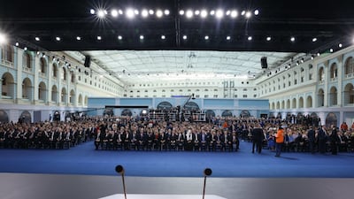 People gather for the state of the nation speech at Gostiny Dvor conference centre in Moscow. EPA
