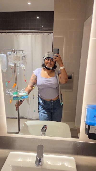 The writer wearing a cold cap to prevent hair loss during chemotherapy. Photo: Jennifer Barretto