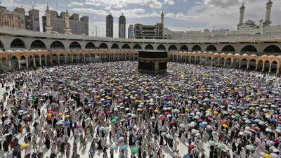 Pilgrims circle around the Kaaba at the Masjidil Haram in Mecca on August 13, 2019. EPA