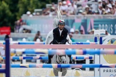 Abdullah Al Marri during the team jumping competition. AP
